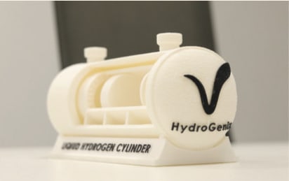 A white 3D-printed model of the HydroGenix liquid hydrogen cylinder.